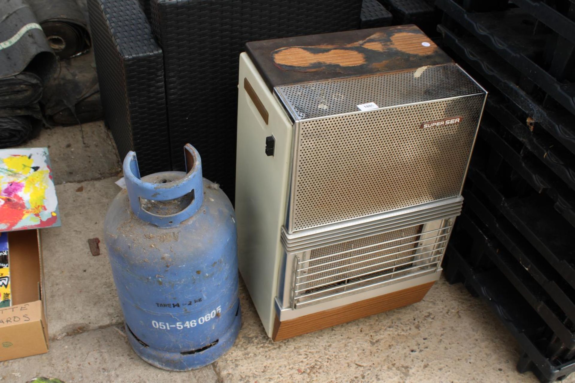 A SUPERSER GAS HEATER AND BOTTLE