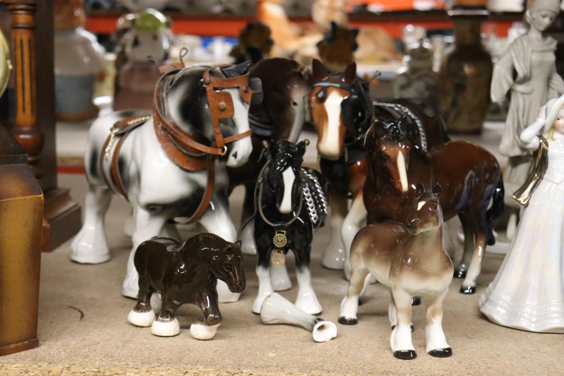 SEVEN CERAMIC HORSE FIGURES, SOME WITH HARNESSES, 1 A/F