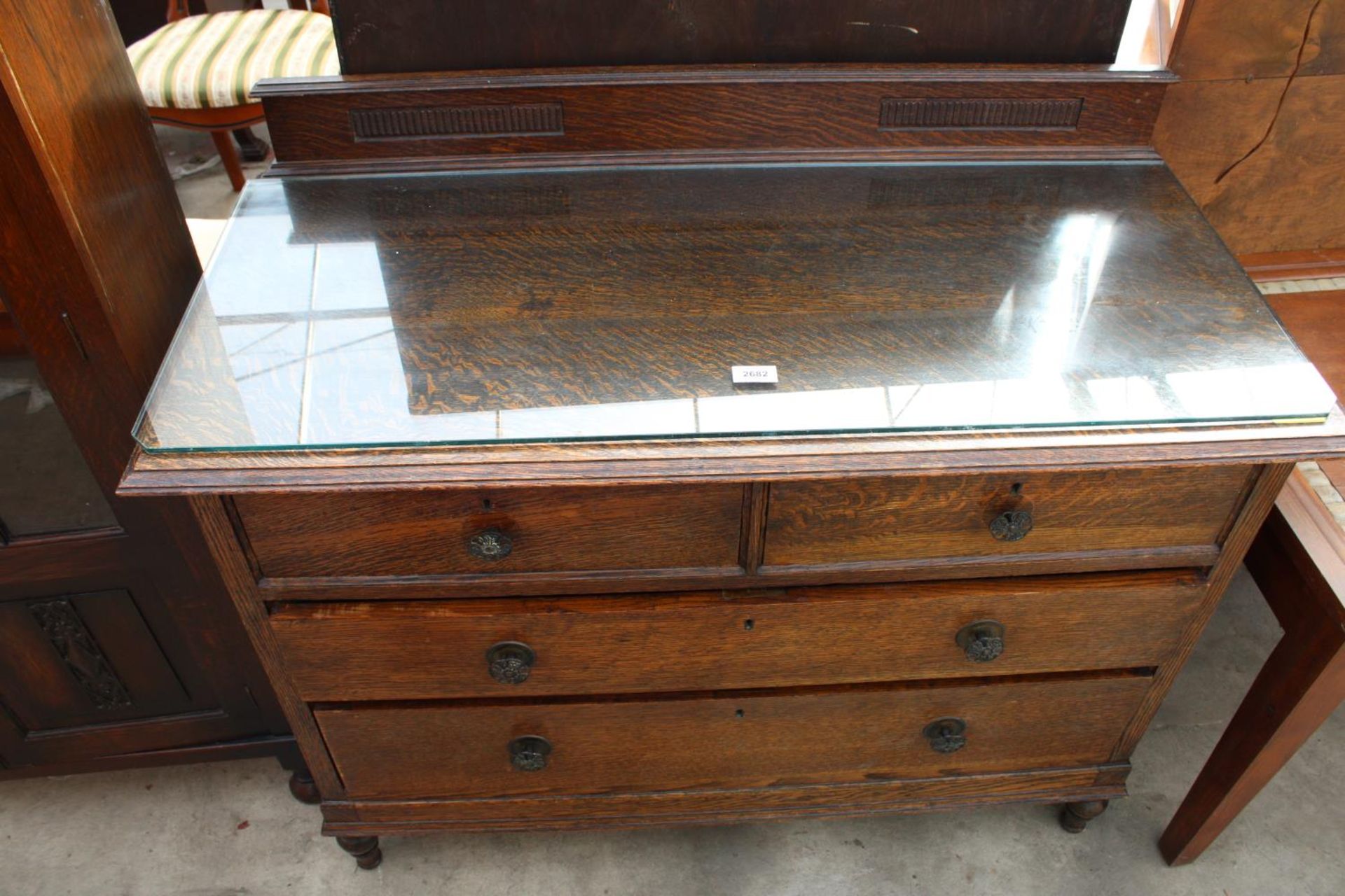 AN EARLY 20TH CENTURY OAK CHEST OF 2 SHORT AND 2 LONG DRAWERS, 42" WIDE