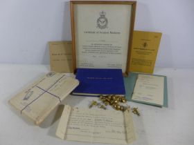 A COLLECTION OF RAF EPHEMERA FROM FLIGHT LIEUTENANT M.F.HUDSON COMPRISING OF BUTTONS, PILOTS LOG