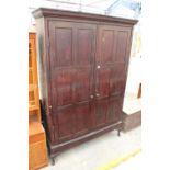 A VICTORIAN PINE PANELLED TWO DOOR STORAGE CUPBOARD ON CABRIOLE LEGS, 59" WIDE, 18.5" DEEP AND 85.5"