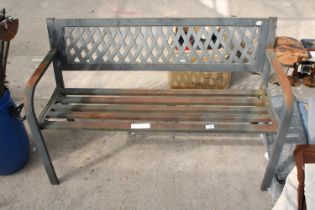 A METAL THREE SEATER GARDEN BENCH