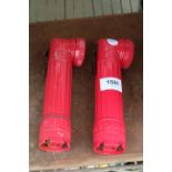 A PAIR OF RED PLASTIC 'POST OFFICE' TORCHES