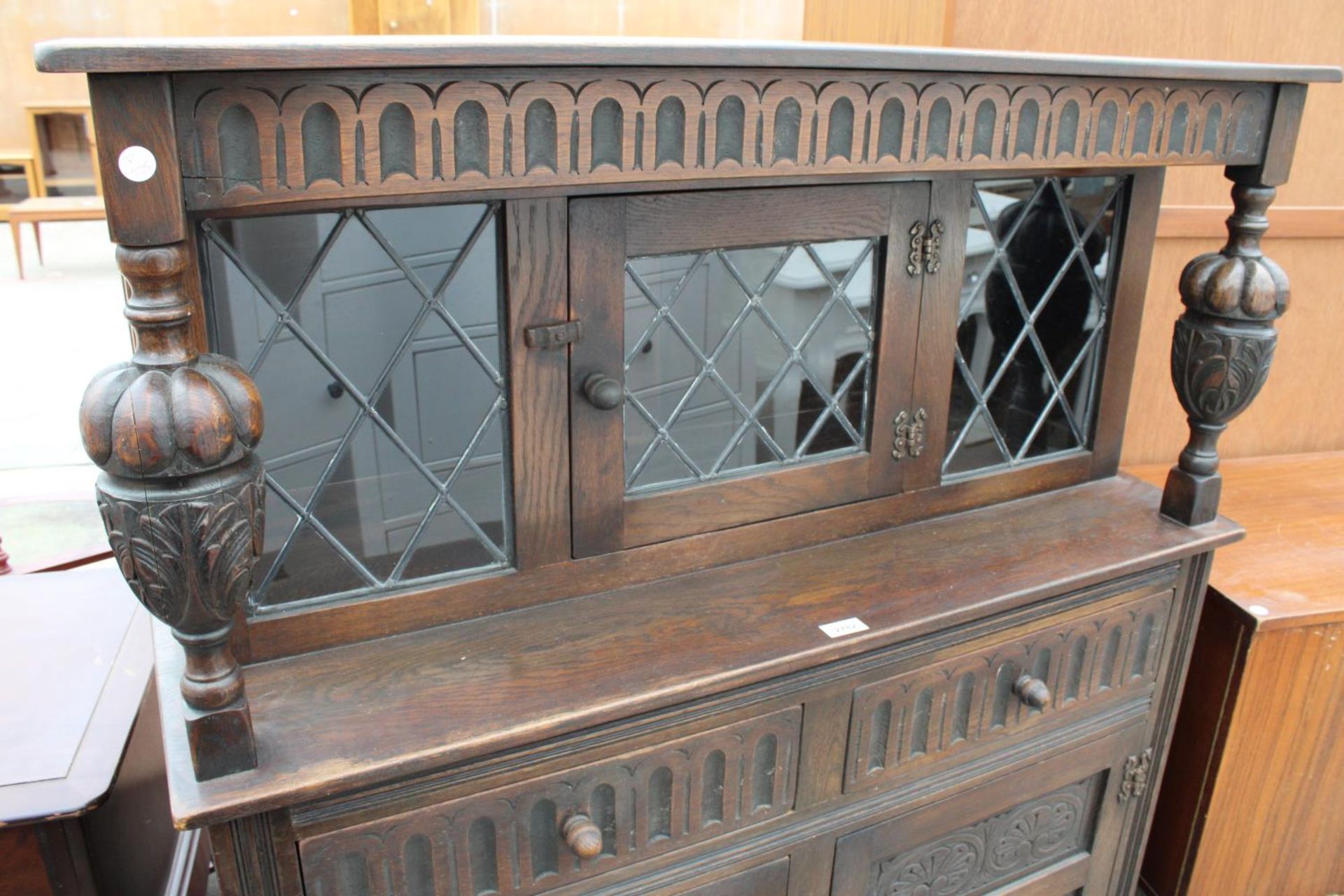 AN OAK JACOBEAN STYLE COURT CUPBOARD WITH GLAZED AND LEADED UPPER PORTION, 54" WIDE - Image 6 of 6