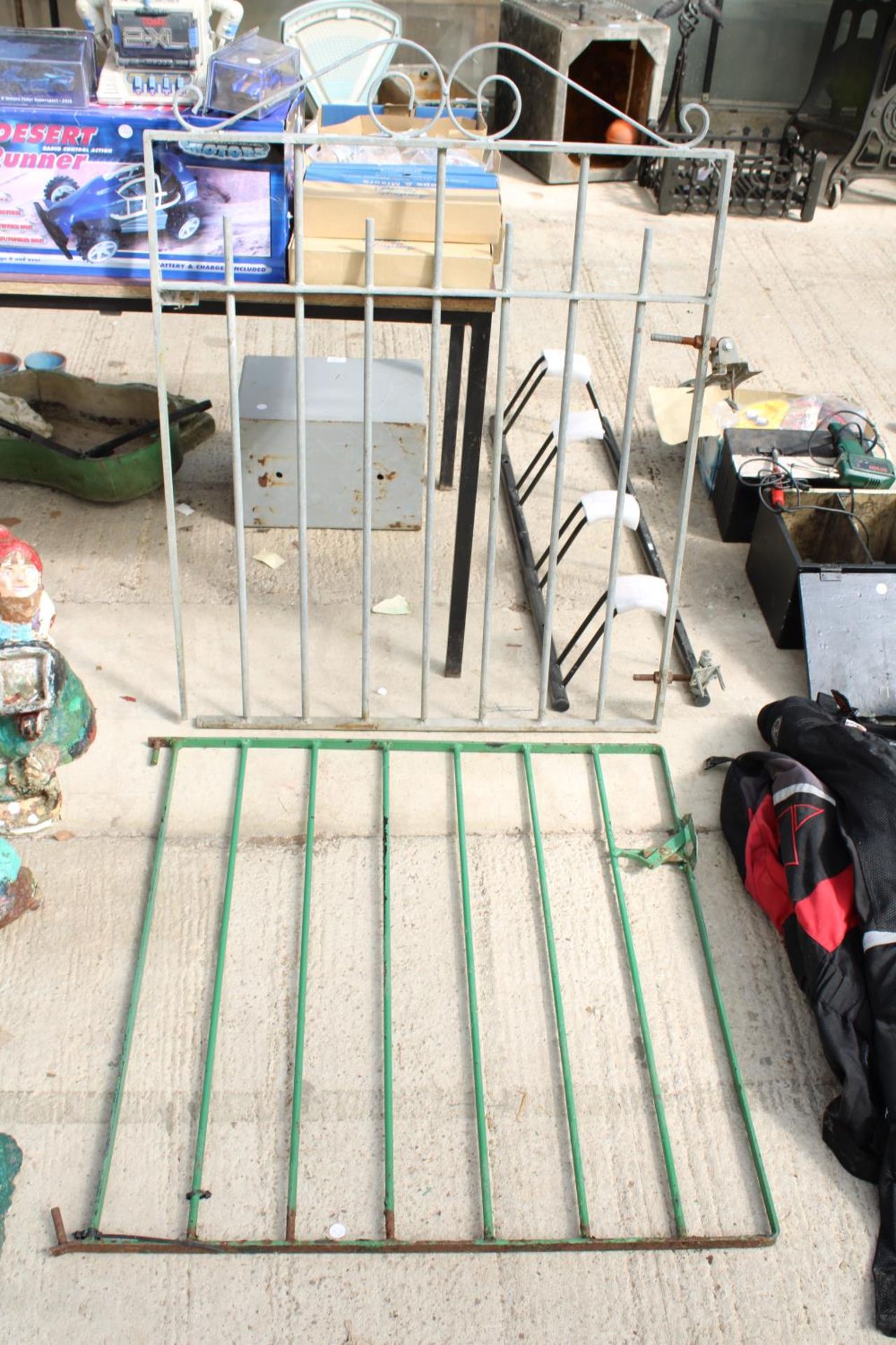 TWO SMALL METAL PEDESTRIAN GARDEN GATES