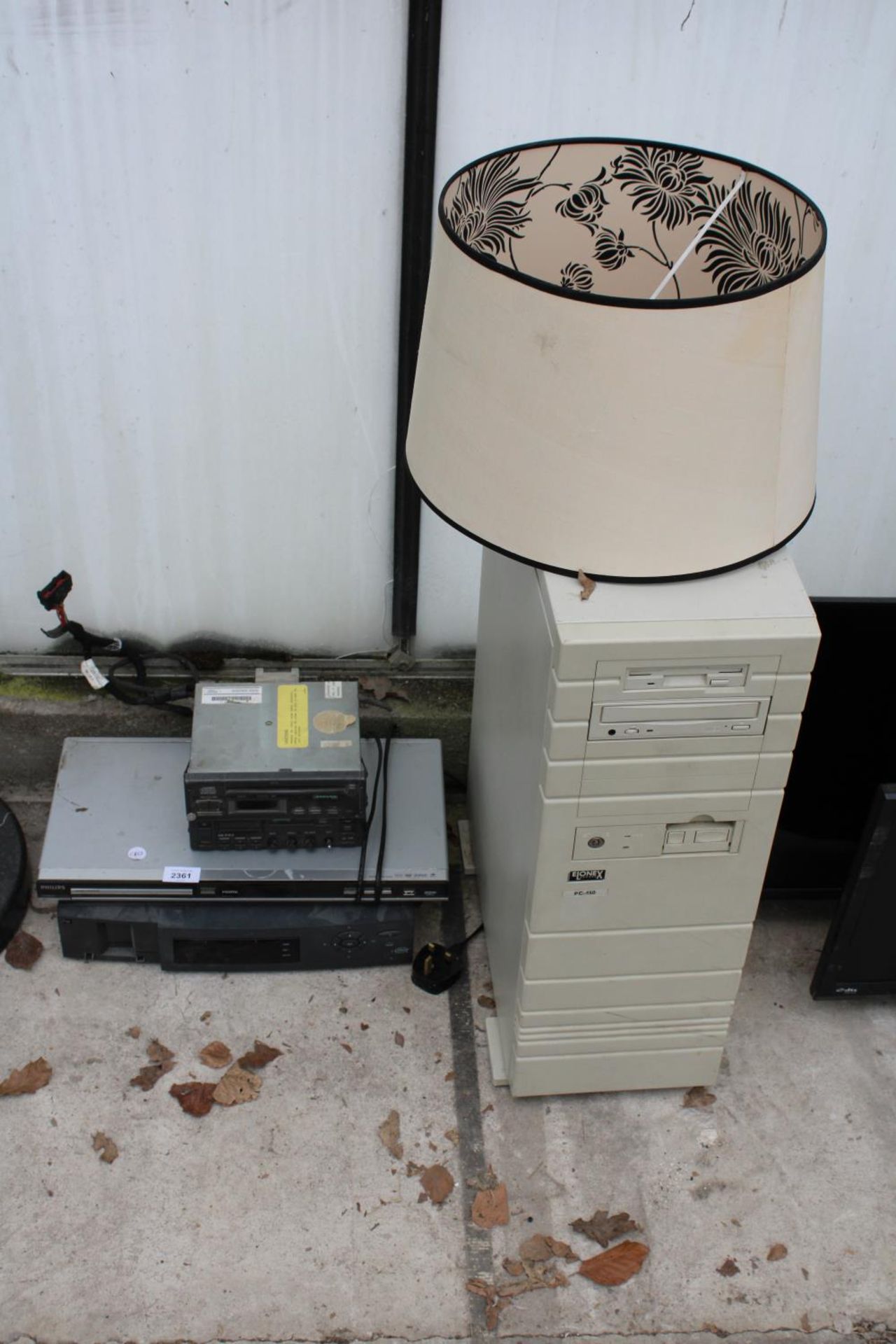 AN ASSORTMENT OF ITEMS TO INCLUDE A COMPUTER TOWER AND A PHILIPS DVD PLAYER