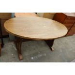 A MODERN OVAL ELM DINING TABLE, 65" X 35"