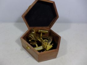 A CASED SMALL BRASS SEXTANT