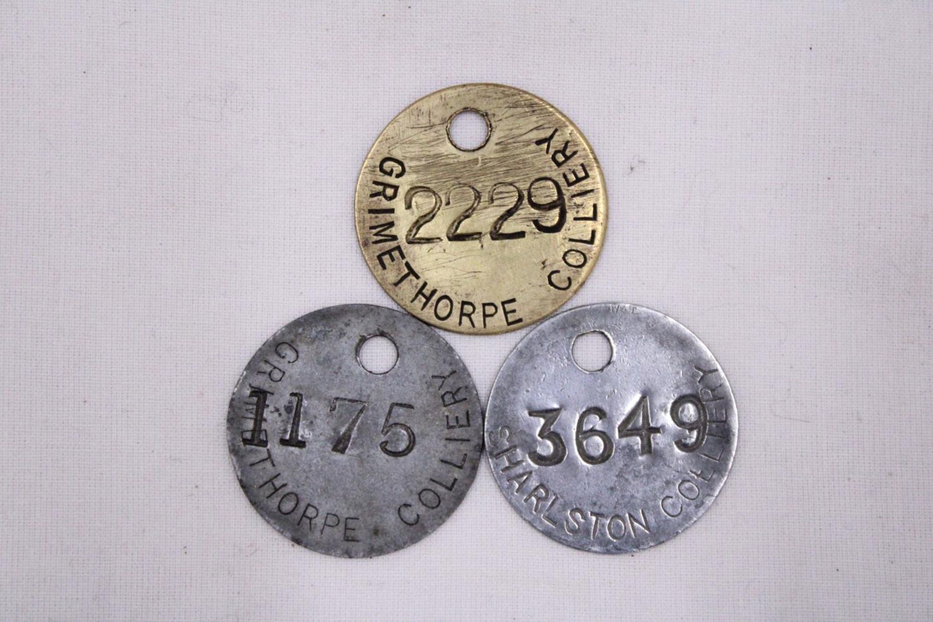 THREE MINERS SAFETY NUMBERED TOKENS - GRIMETHORPE AND SHARLSTON COLLIARYS - Image 2 of 3