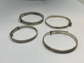 FOUR SILVER BANGLES