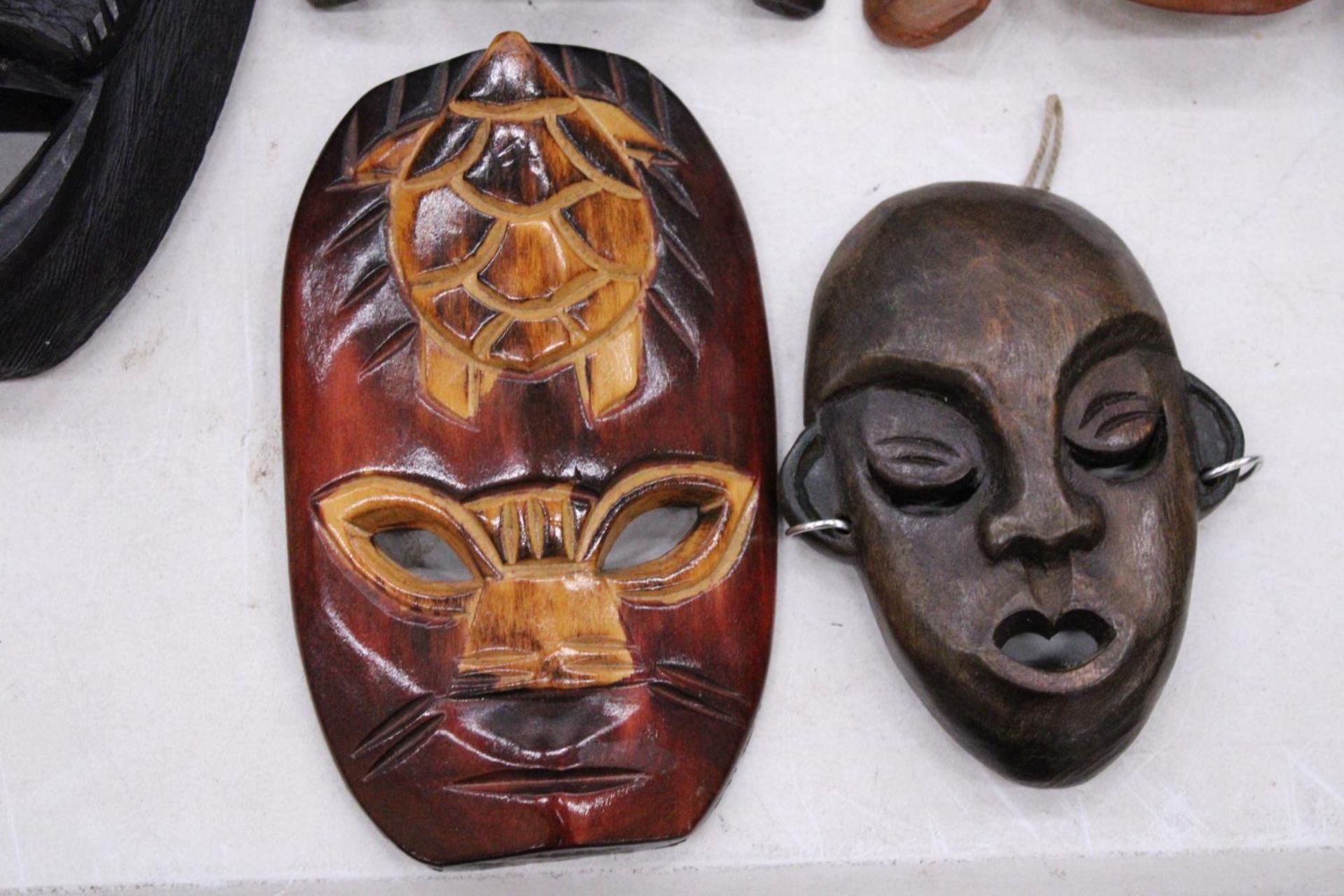 FIVE AFRICAN HAND CARVED WOODEN MASKS - PLUS TWO SPEARS - Image 3 of 5