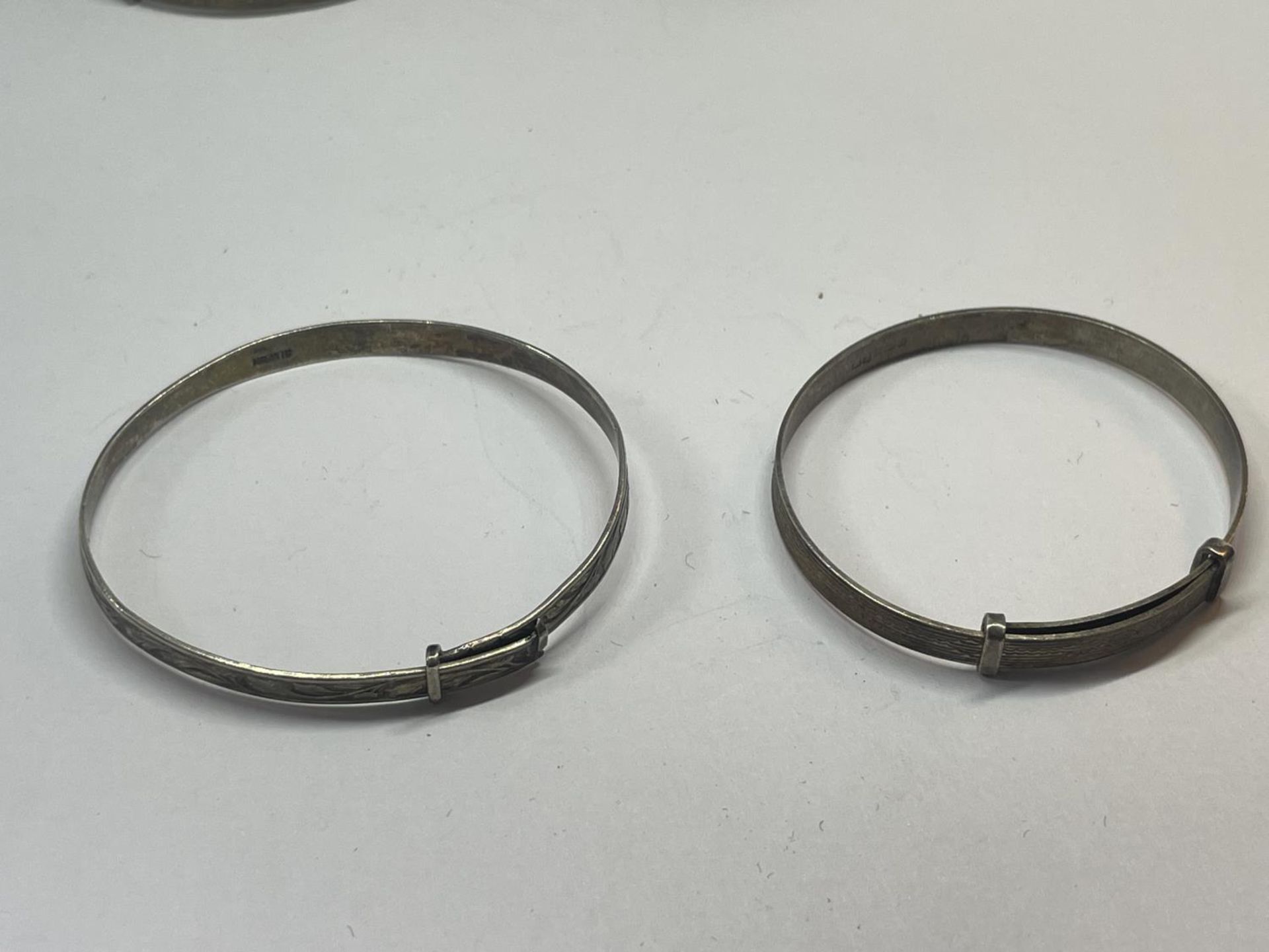 FOUR SILVER BABY BANGLES - Image 3 of 3