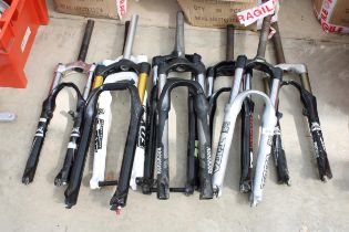 AN ASSORTMENT OF BIKE FRONT FORKS WITH SUSPENSION