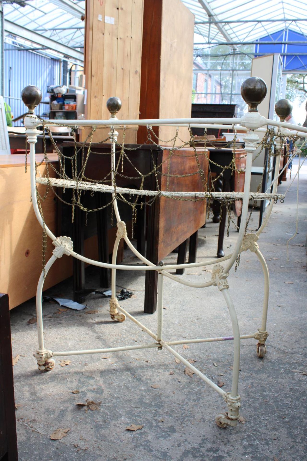 A VICTORIAN CAST IRON FOLDING COT WITH BRASS KNOBS BEARING HOSKINS PATENT COT LABEL - Image 4 of 4