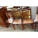 THREE 19TH CENTURY ELM DINING CHAIRS WITH TURNED SPINDLES AND SOLID SEATS