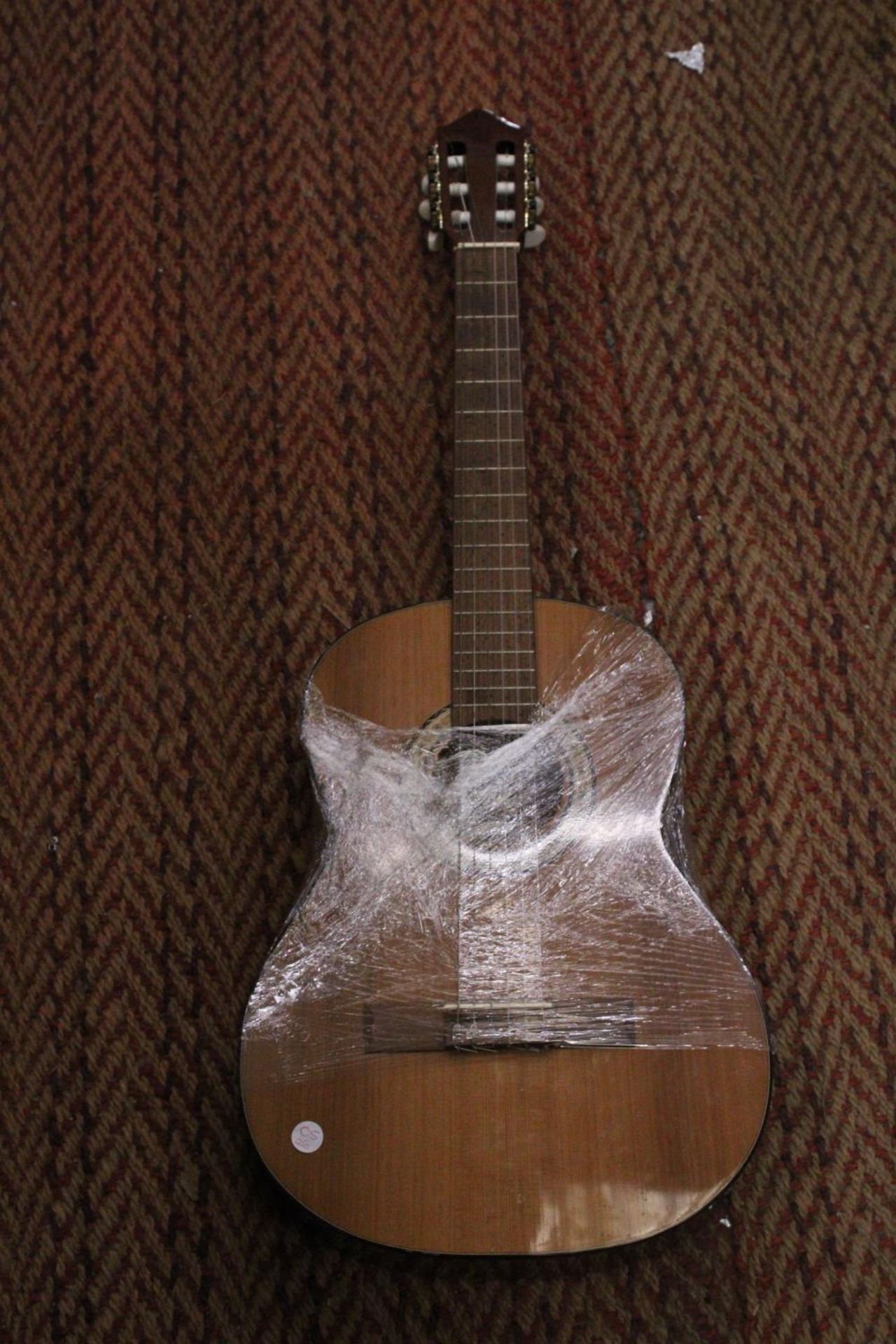 A STRUNAL CLASSICAL ACOUSTIC GUITAR