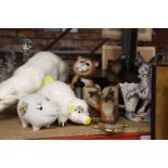 A COLLECTION OF ANIMAL FIGURES TO INCLUDE A LARGE POLAR BEAR - A/F, PIGGY BANKS, A BEAR, CAT,