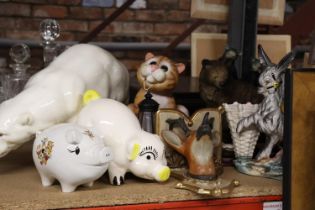 A COLLECTION OF ANIMAL FIGURES TO INCLUDE A LARGE POLAR BEAR - A/F, PIGGY BANKS, A BEAR, CAT,