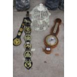 THREE ITEMS TO INCLUDE A BAROMETER, BIRDCAGE AND HORSE BRASSES