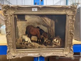 A GILT FRAMED OIL ON BOARD OF A HORSE IN A STABLE WITH TWO GOATS 11" X 15.5"
