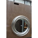 A MODERN SALON SILVER SWIRL WALL MIRROR, 27" DIAMETER