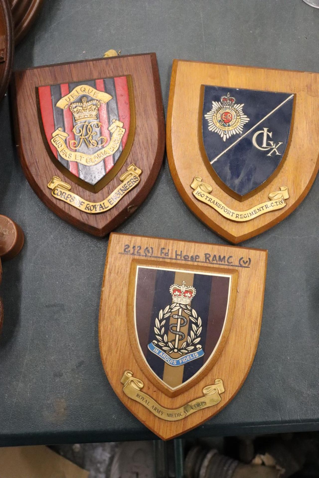 THREE HARDWOOD MILITARY PLAQUES