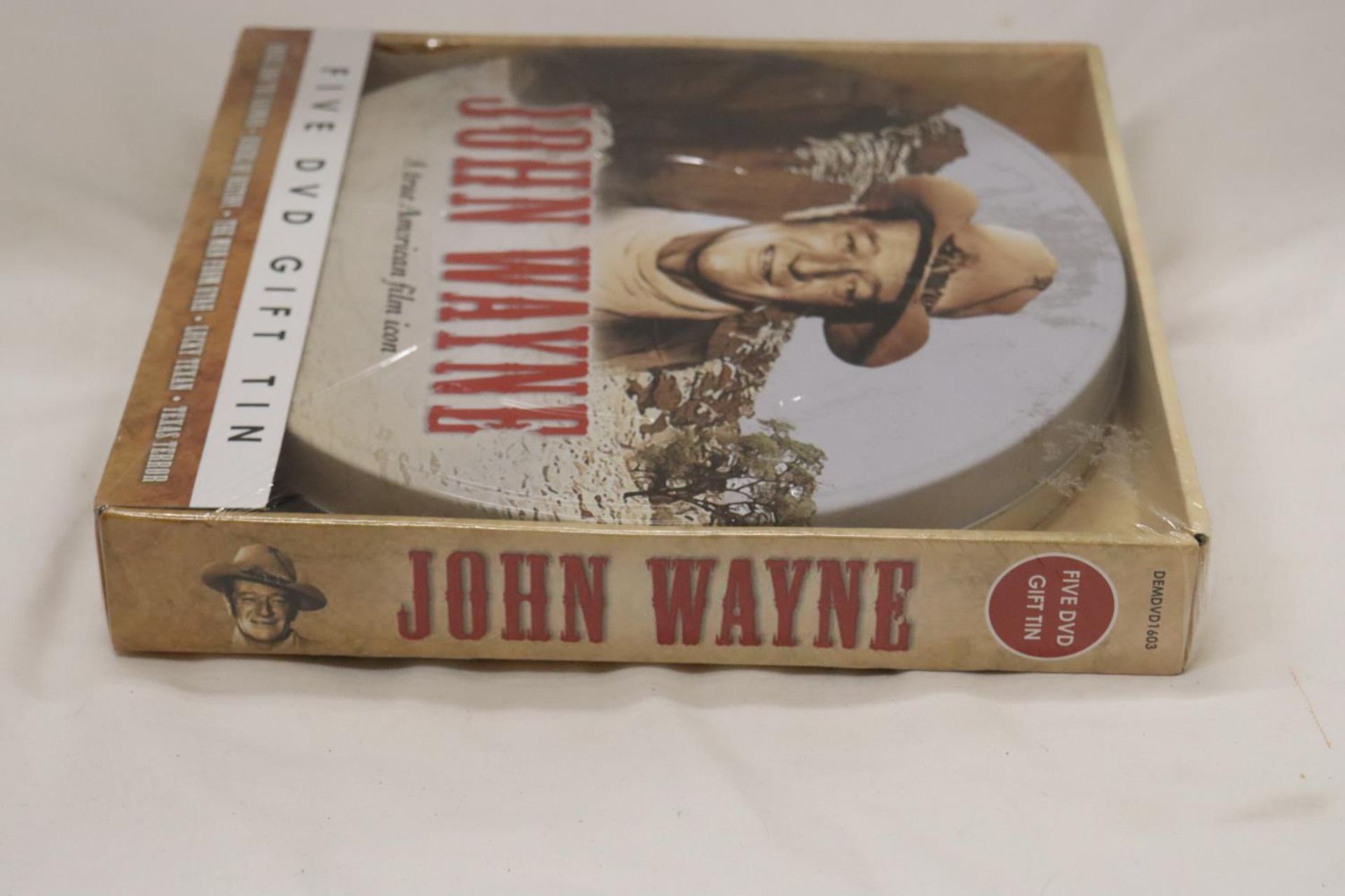 A NEW AND SEALED SET OF FIVE JOHN WAYNE DVD'S IN A METAL GIFT TIN - Image 2 of 4