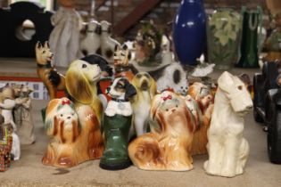 A COLLECTION OF TWELVE DOG FIGURES