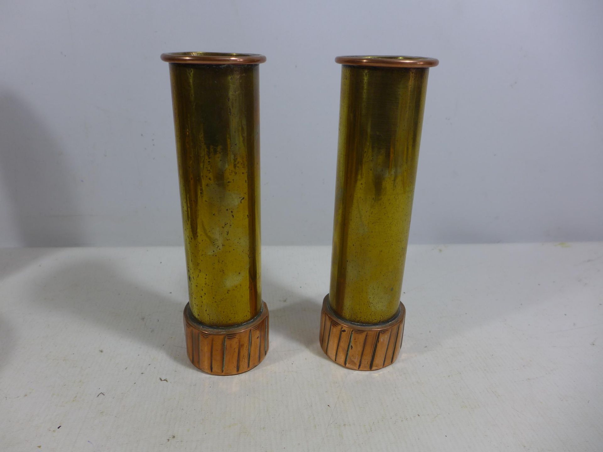 A PAIR OF BRASS EARLY 20TH CENTURY TRENCH ART VASES MADE FROM SHELLS, HEIGHT 20CM