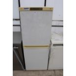 A WHITE EXPRESS COOL UPRIGHT FRIDGE FREEZER