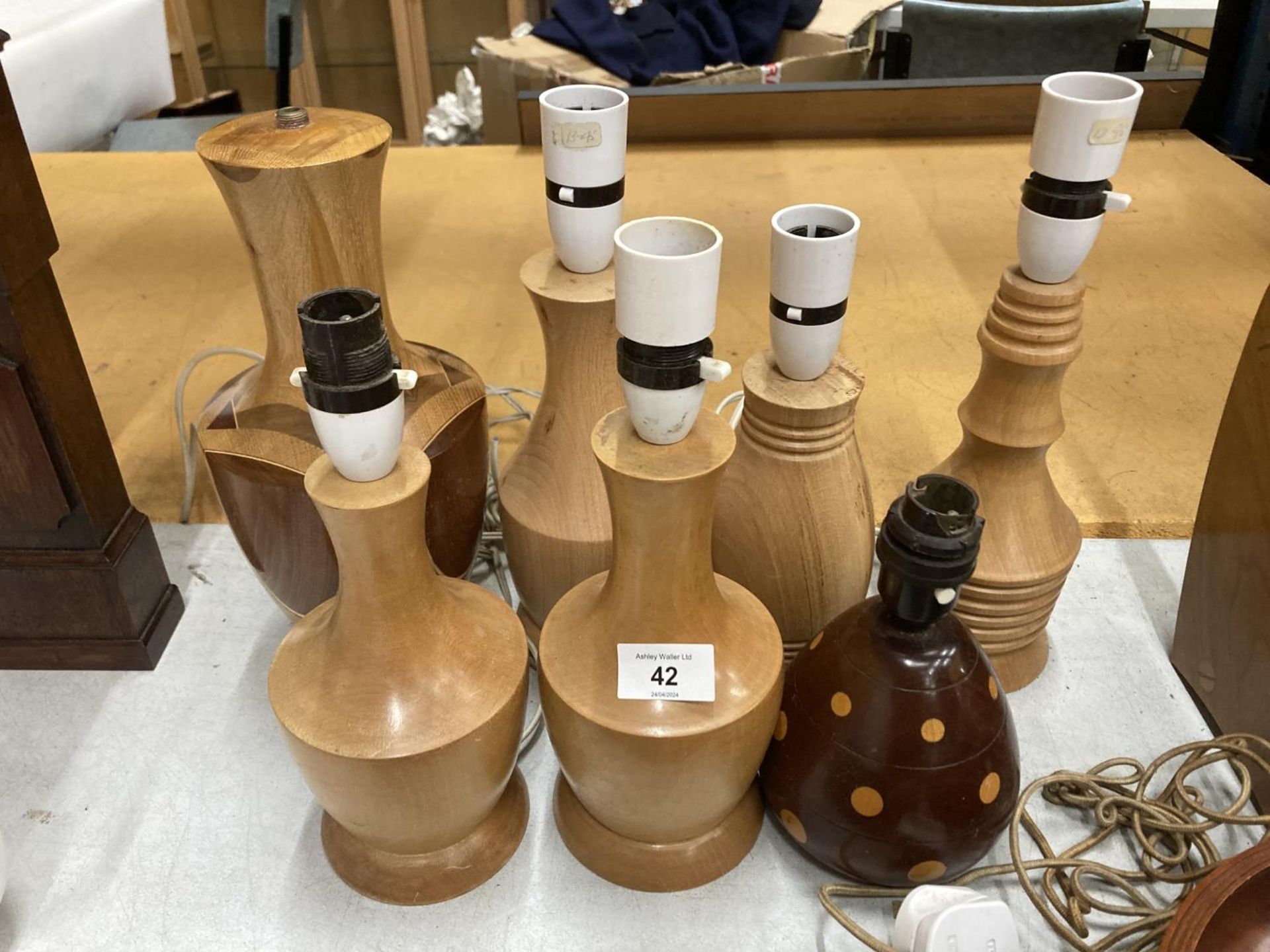 SEVEN VARIOUS LAMP BASES HANDCRAFTED BY GORDON WARR WITH A LETTER OF PROVENANCE