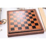 A LEATHERBOUND CHESS BOARD WITH METAL CHESS PIECES - COMPLETE