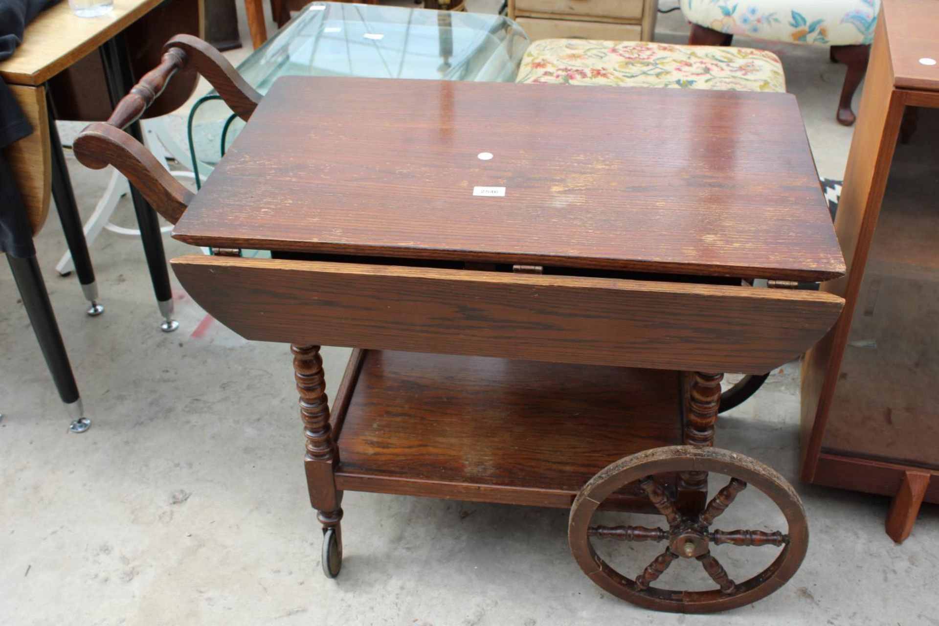 A MODERN OAK DROP-LEAF TROLLEY (1 LEAF A/F)