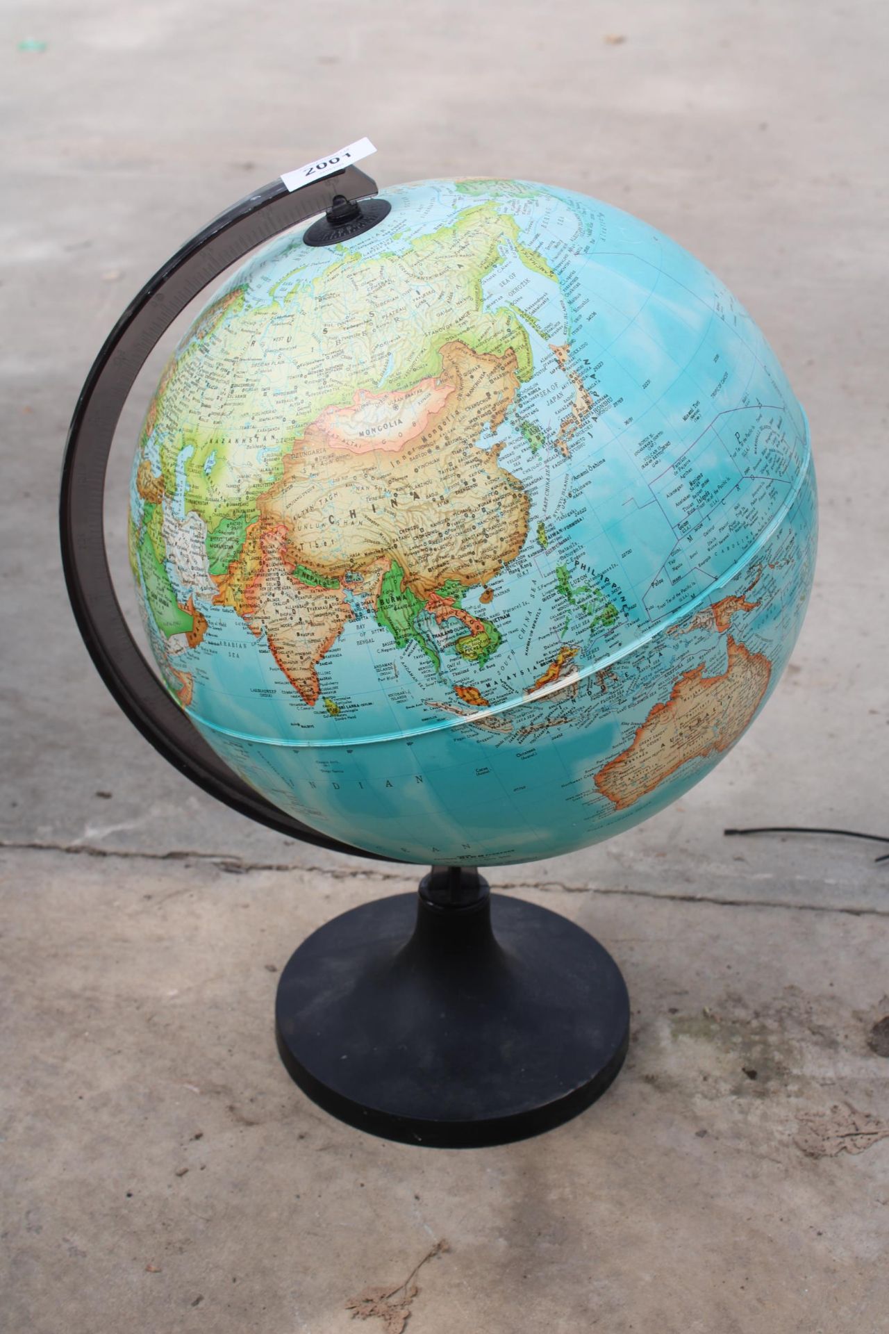A WORLD GLOBE COMPLETE WITH STAND