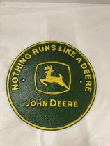 A CAST 'NOTHING RUNS LIKE A DEERE' CIRCULAR JOHN DEERE SIGN