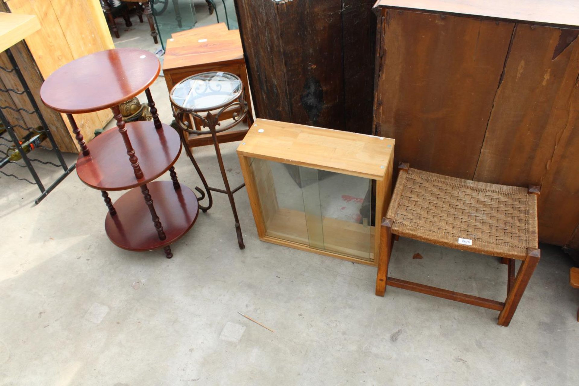 AN OAK STOOL, METAL PLANT STAND, 2 DOOR WALL CABINET AND 3 TIER WHATNOT