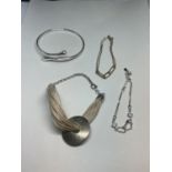 THREE SILVER BRACELETS AND A SILVER BANGLE