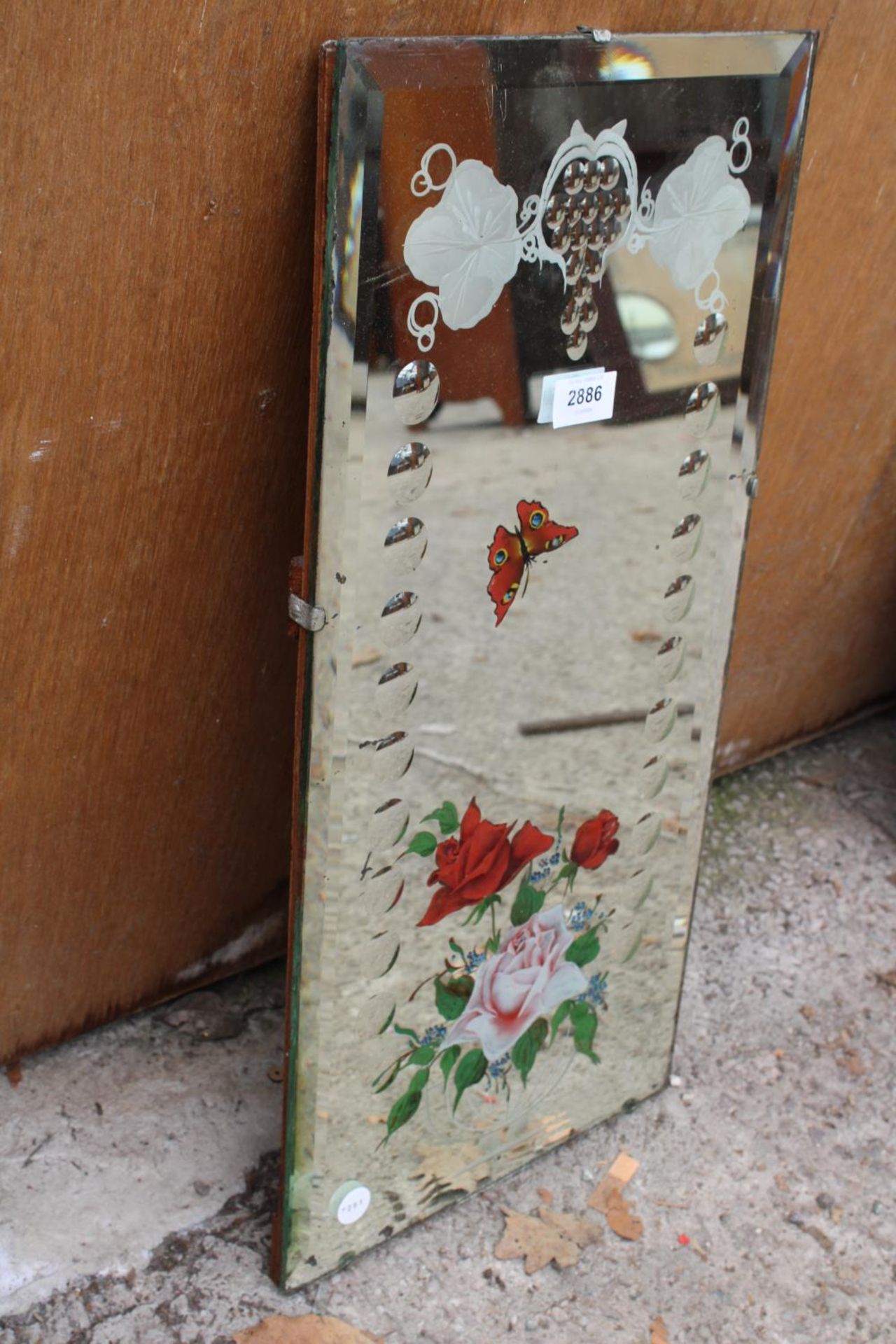 A MID 20TH CENTURY FRAMELESS WALL MIRROR WITH FLORAL AND BUTTERFLY DECORATION 23" X 11" - Image 2 of 2