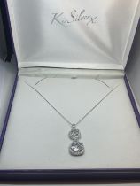 A BOXED SILVER NECKLACE