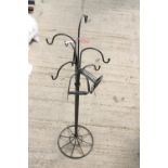 A DECORATIVE METAL HAT STAND