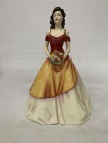 A BOXED ROYAL DOULTON FIGURE FROM THE PRETTY LADIES COLLECTION " LINDA"