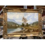 A GILT FRAMED OIL ON CANVAS OF A LAKE SCENE WITH A FARMER MOVING STOCK SIGNED JACK R MOULD TO