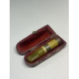 A SILVER AND BUTTERSCOTCH AMBER CHEROOT HOLDER
