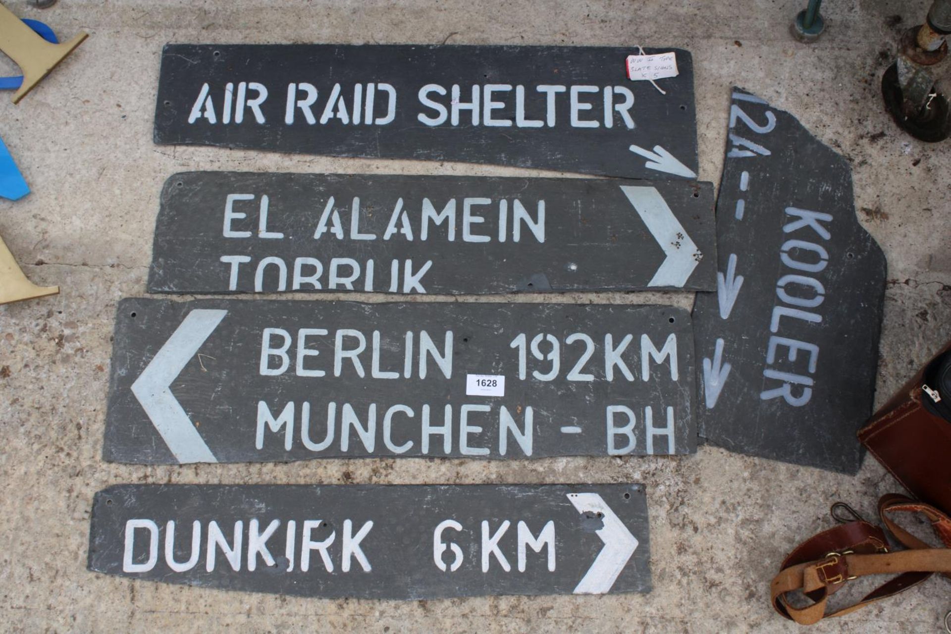 FIVE SLATE SIGN IN THE STYLE OF WWII SIGNS