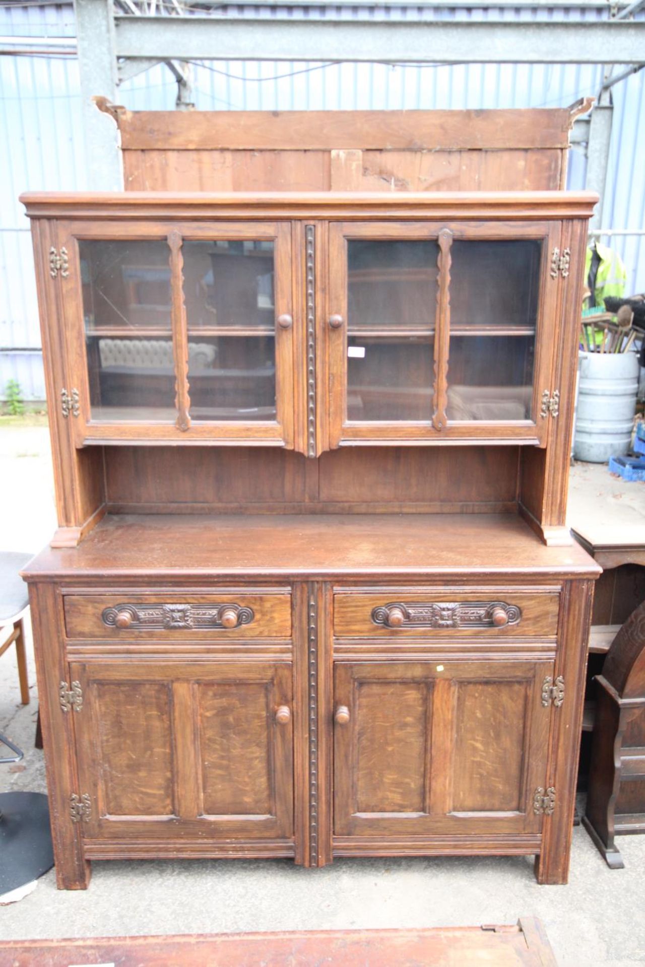 AN OAK AND BEECH E.GOMME FURNITURE DRESSER WITH GLAZED UPPER PORTION 55" WIDE