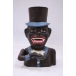 A VINTAGE CAST IRON AFRICAN AMERICAN IN TOP HAT