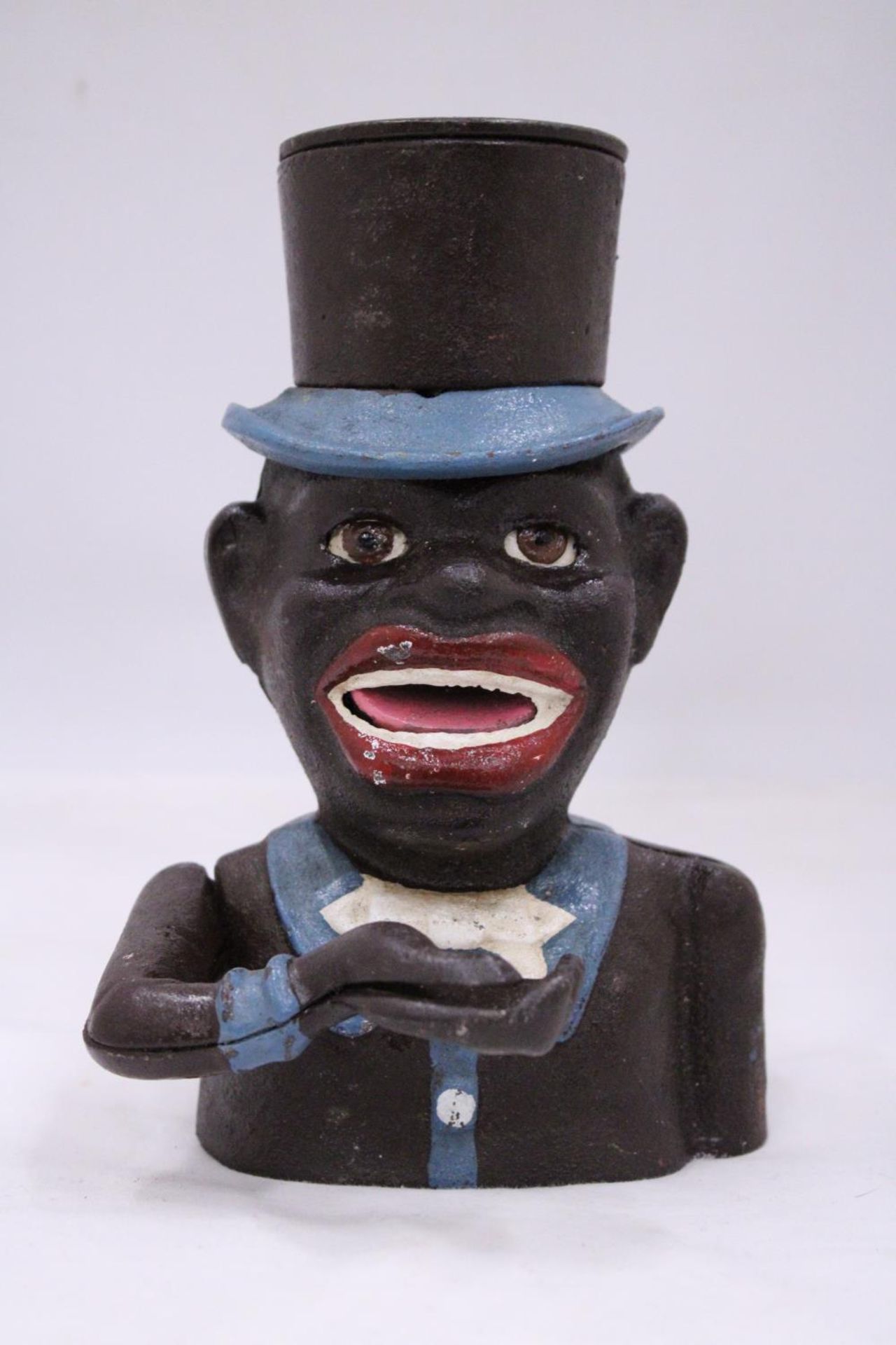 A VINTAGE CAST IRON AFRICAN AMERICAN IN TOP HAT