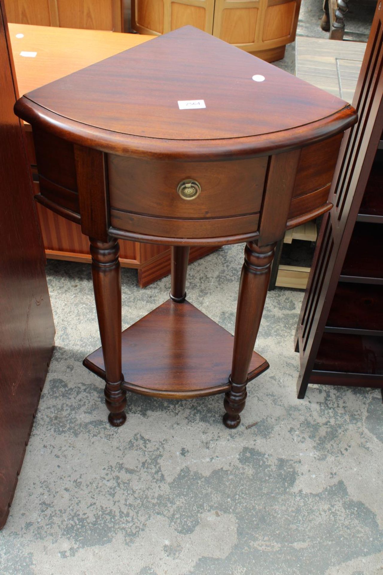 A MODERN HARDWOOD CORNER TABLE