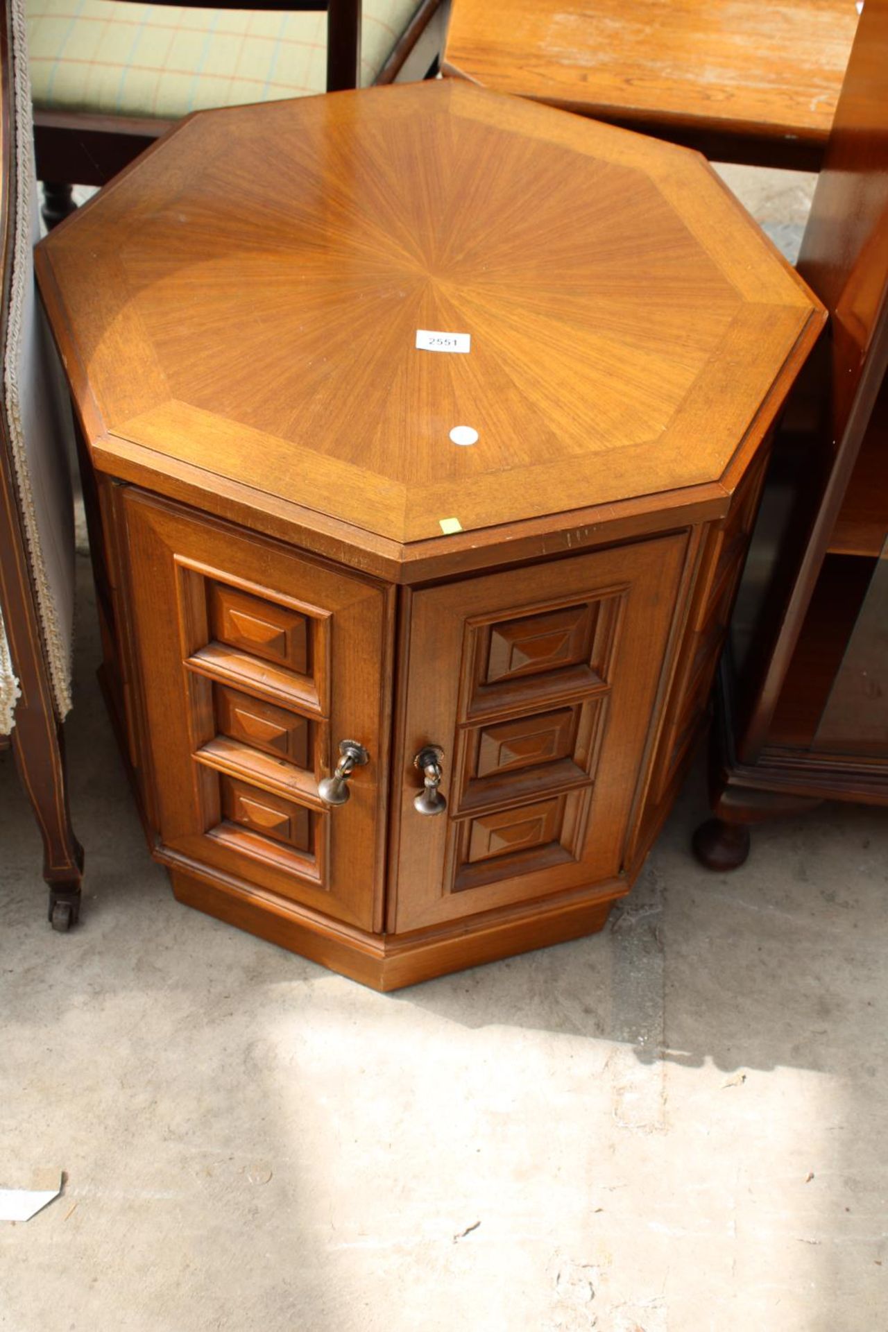 A MODERN OCTAGONAL A.S.F. & CO CUPBOARD WITH INLAID TOP AND PANELLED DOORS, 24" ACROSS