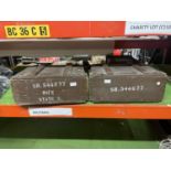 TWO GREEN PAINTED AMMUNITION BOXES MARKED SR 544677, AND A 1950 MILITARY ENAMEL PLATE (3)